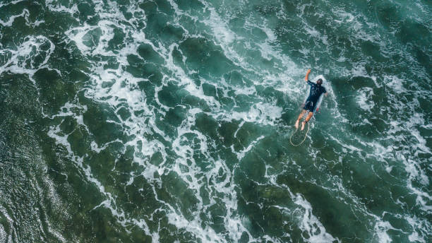 istock Surfer in Turquoise Water 1346510958