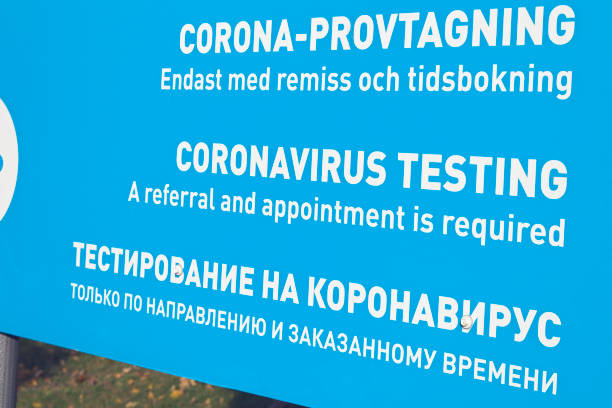 istock covid-19 testing center sign outdoors 1346512189
