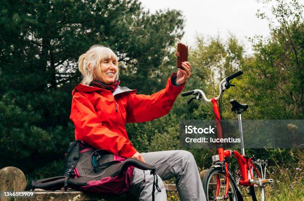 Cycle Ride Through A Forest Stock Photo - Download Image Now - Cycling, Red, Rural Scene