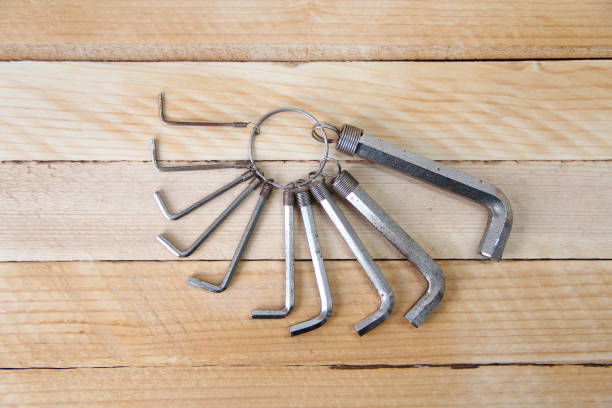 istock Set of hex keys on a ring on a wooden background 1346515082