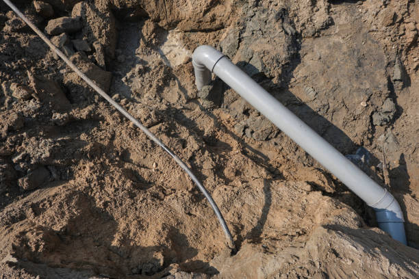 istock Plastic pipes in the ground during the construction of a building, bunner 1346516348