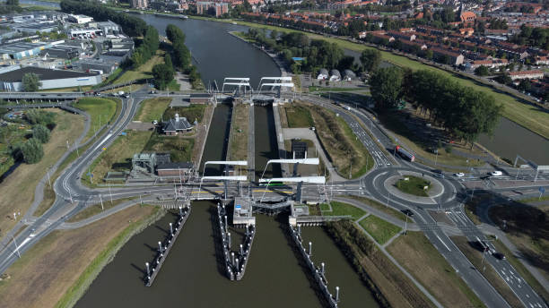 istock gateway lock sluice drawbridge construction on river, canal for passing vessels at different water levels 1346516375