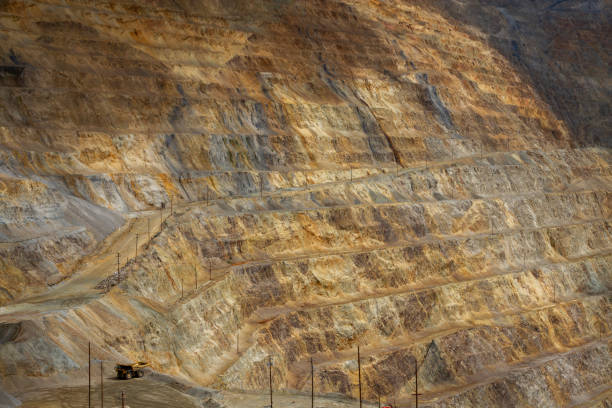 istock Excavation open pit mine. Copper, gold and silver mine operation 1346516435
