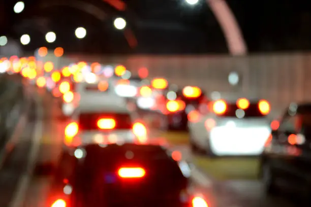 Traffic jam by many cars in tunnel