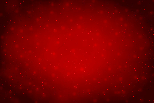 Horizontal vector illustration of dark red colored paper textured Xmas wallpaper. There are smudges and shiny dots all over. There is no people and no text. Can be used as Christmas, New Year party wallpaper, celebration, festive backdrops, gift wrapping sheet, banners and posters.