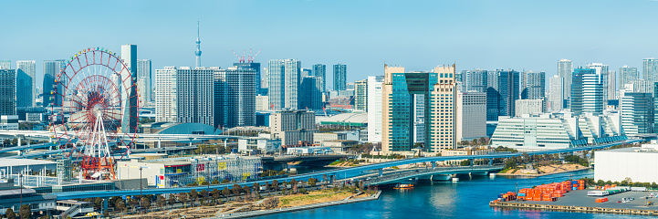 Aerial panoramic view across the landmarks of Odaiba, the popular entertainment, shopping and leisure district in Tokyo harbour, Japan.