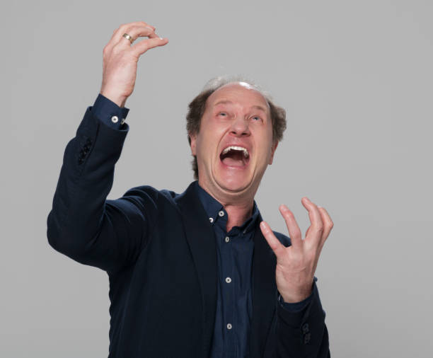 istock Portrait of happy man gesturing 1346524511
