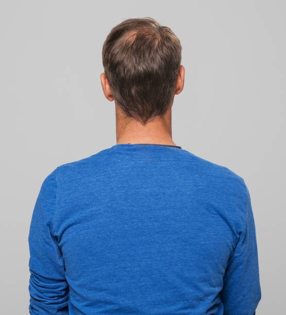 istock Rear view of mature man 1346527601