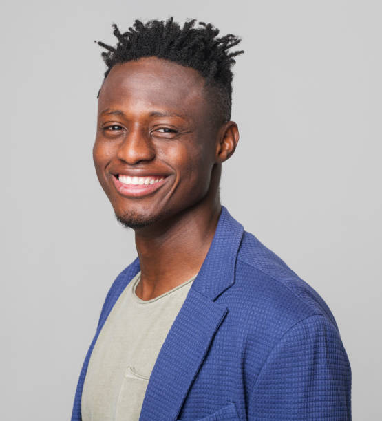 istock Side view of smiling young businessman 1346530163