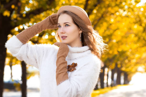 istock Autumn accessories. Hat, gloves, beaded brooch in leaf shape 1346530606