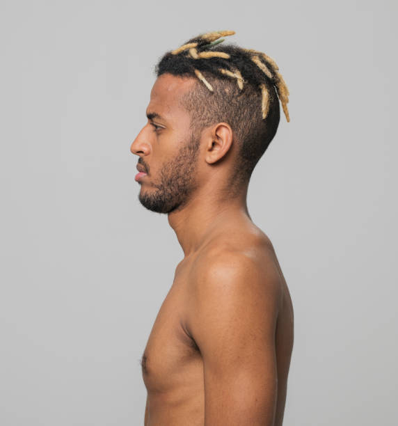 istock Profile of shirtless young man 1346530639
