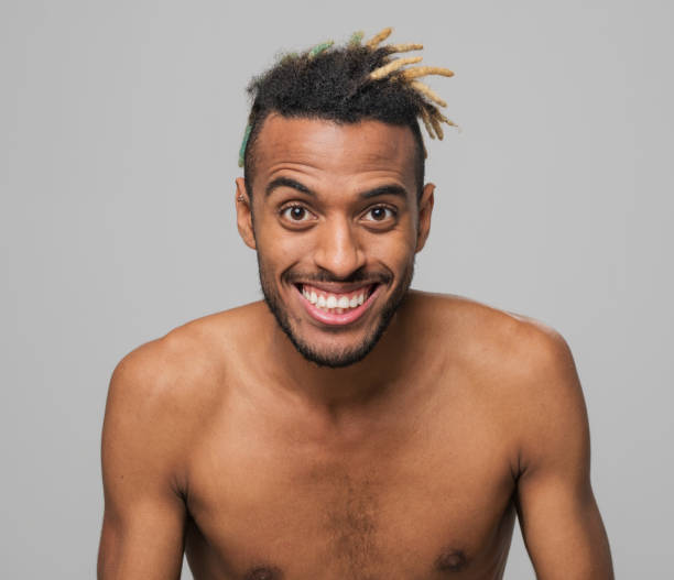 istock Close-up of smiling young man 1346530683