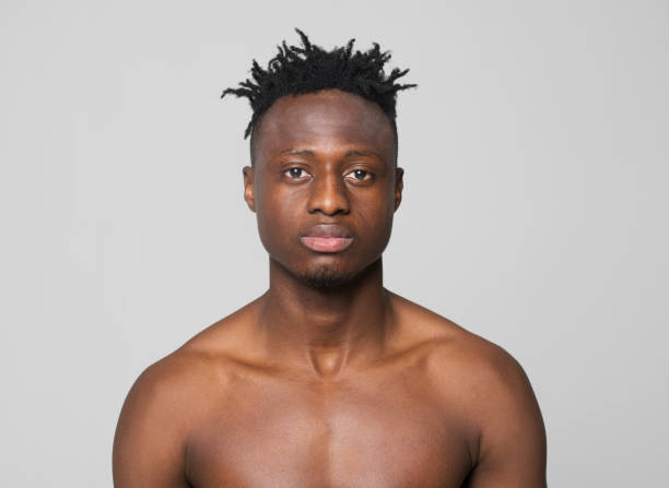 istock Close-up of shirtless young man 1346531369