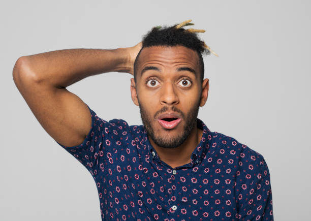 istock Close-up of shocked young man 1346531408