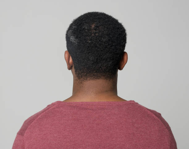 istock Rear view of mid adult man 1346531439