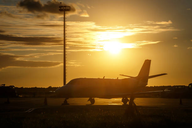 istock Private jet in the airport at sunset. 1346533785