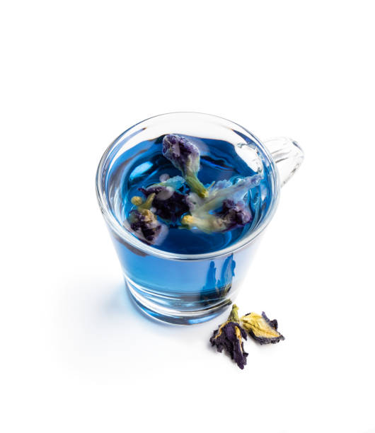 istock Butterfly pea flower tea in clear glass mug isolated on white 1346534283