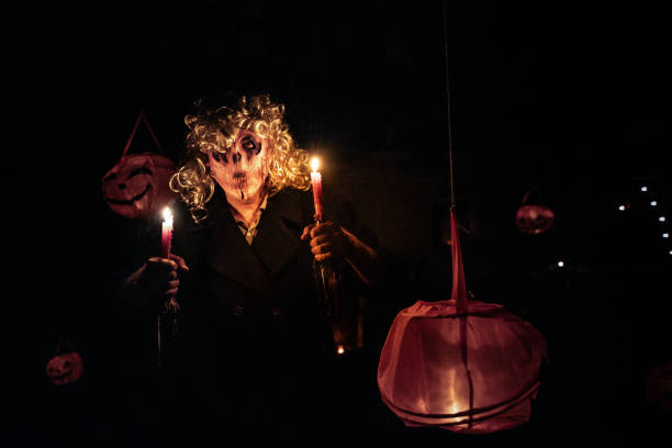 istock Mystery Man in Spooky Halloween Mask 1346535088