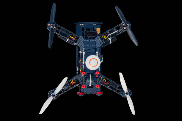 istock Dron, quadro copter Isolated on black background, closeup. 1346535488