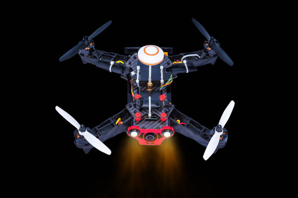 istock Dron, quadro copter Isolated on black background, closeup. 1346535494