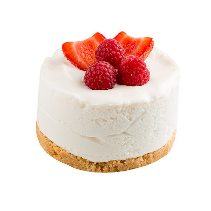 Isolated mini cheesecake with berries on the white background