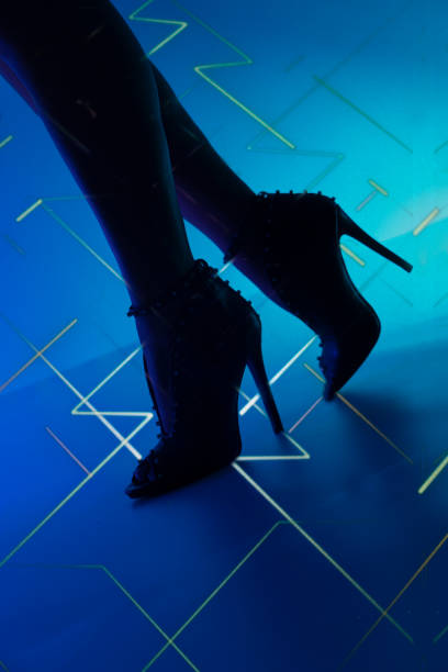 istock Sexy young lady dancer in high heel stiletto shoes 1346538980