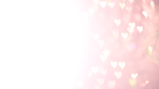 Abstract blur background. Pink soft pastel heart love bokeh. Valentine's day or mother's day concept. Tender romantic texture. Free copyspace. Head banner or card design