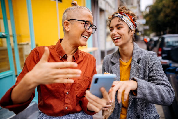 istock Receiving good news on line outside 1346541121