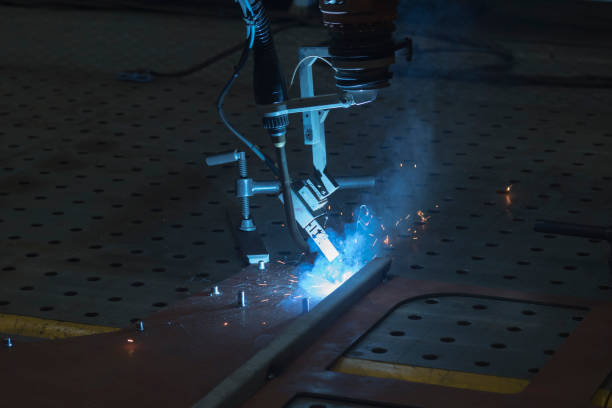istock Application of automatic welding robot in metal welding 1346542197