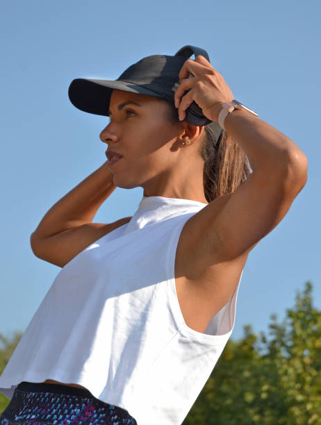 istock Outdoors workout latin woman with headphones 1346542957