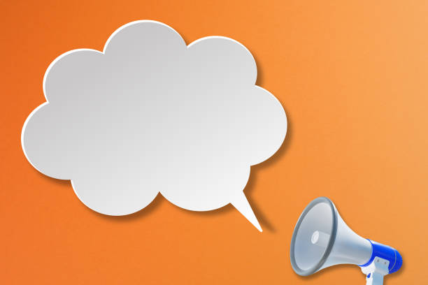 Megaphone with blank white speech bubble on orange background. Template with copy space for text for design