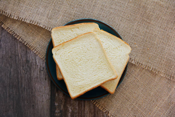 istock Square slices of fresh toast bread 1346547072