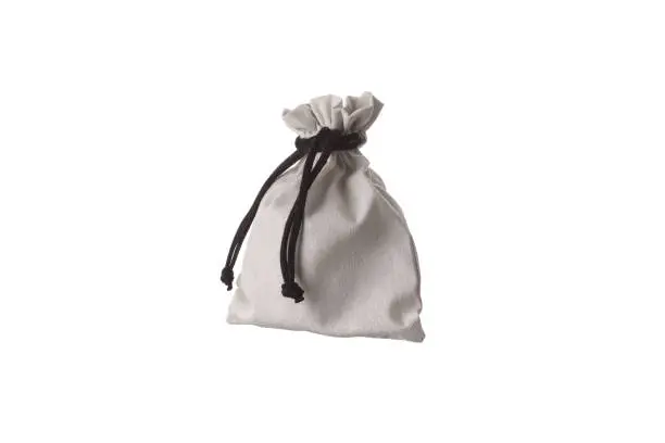 Small fabric pouch with a drawstring for tying. Isolate on a white background.