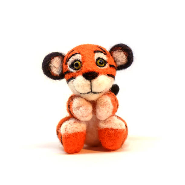 istock Toy handmade tiger, felting wool 1346552893