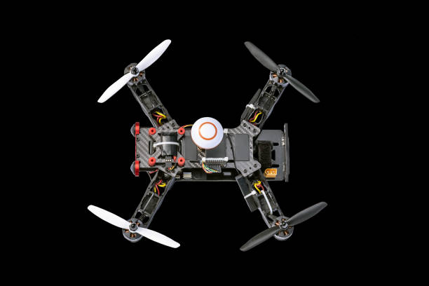 istock Dron, quadro copter Isolated on black background, closeup. 1346553069