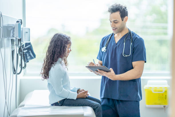 istock Young Girl at a Check-up 1346555554