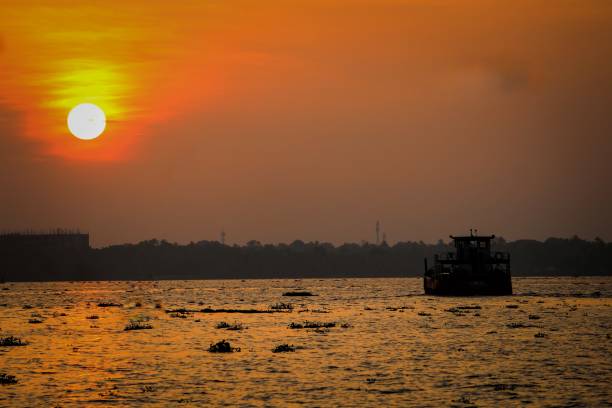 istock A beautiful sunset in the lake with a boat 1346555786