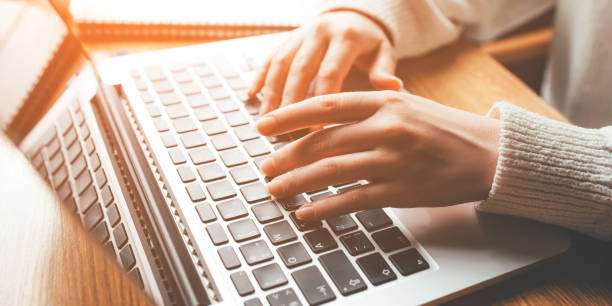 istock Young woman working in home on her laptop computer. 1346555922