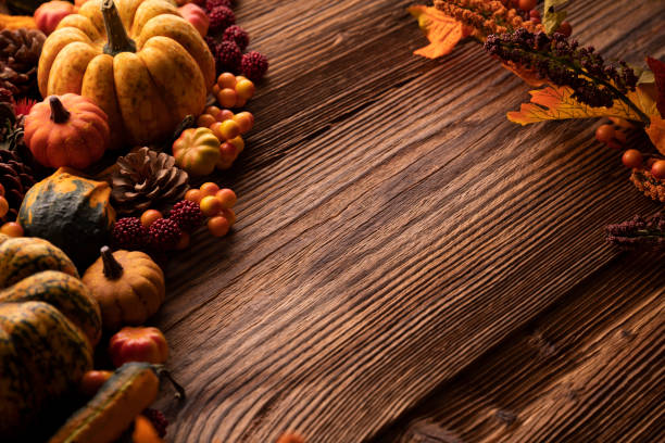 istock Autumn composition on a rustic wooden background. 1346555969