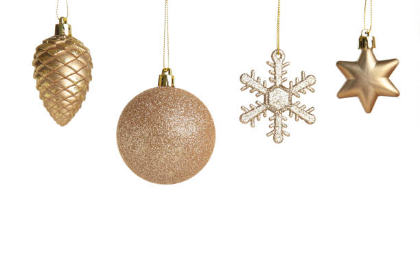 istock Golden Christmas toys isolated on white background 1346557980