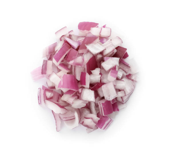 istock Pile of chopped red onion isolated on white, top view 1346558162