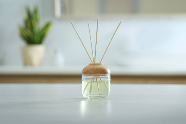 istock Aromatic reed air freshener on table indoors 1346558176