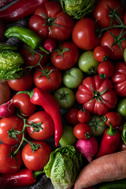 istock Green and Red Ripe Tomatoes 1346558322