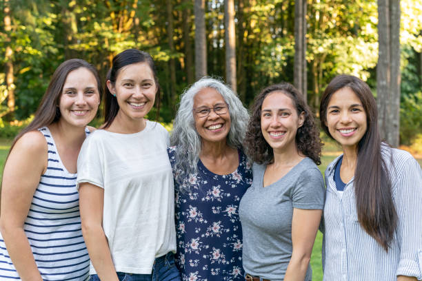istock Multi-ethnic group of women outdoors 1346559635