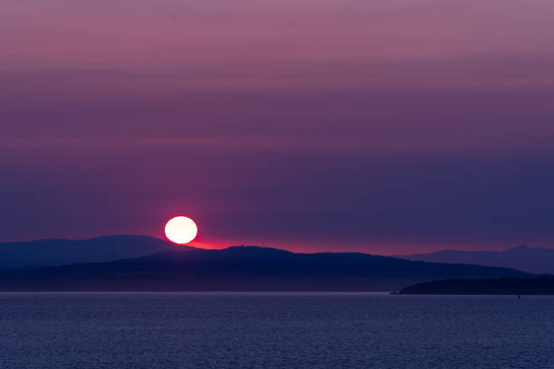 istock Sunset over the sea, Jones Island, Washington State 1346559730