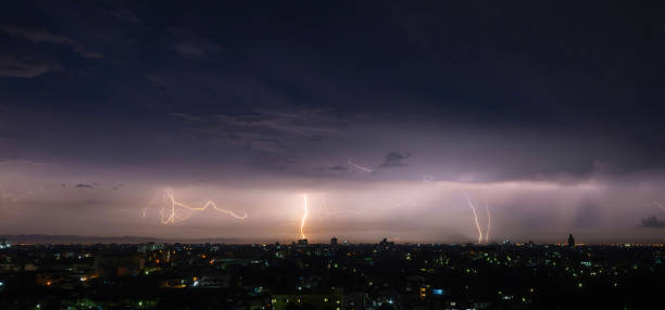 istock Realistic lightning in city at night background. Electricity. Natural light effect, bright glowing. Thunder 1346561859