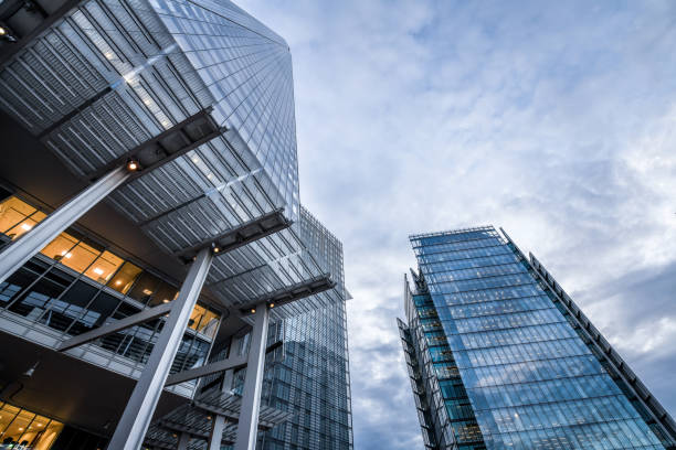 istock Sunset Falling Over Financial District Buildings In London, UK 1346565041