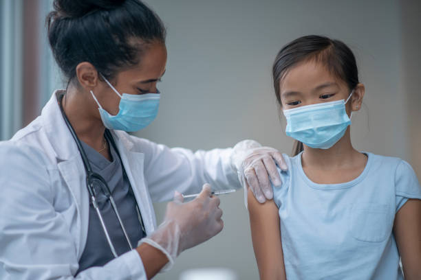 istock Young Girl Receiving a Vaccination 1346566696