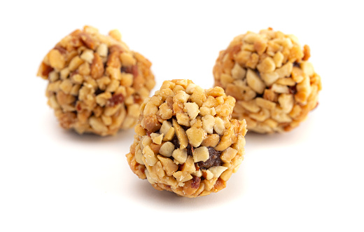 Chocolate Peanut Butter Energy Balls on a White Background