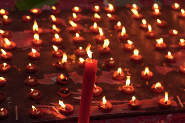 Arrangement of 108 earthen diyas, ignited during Sandhi puja ritual. It is a major part of Durga puja festival.